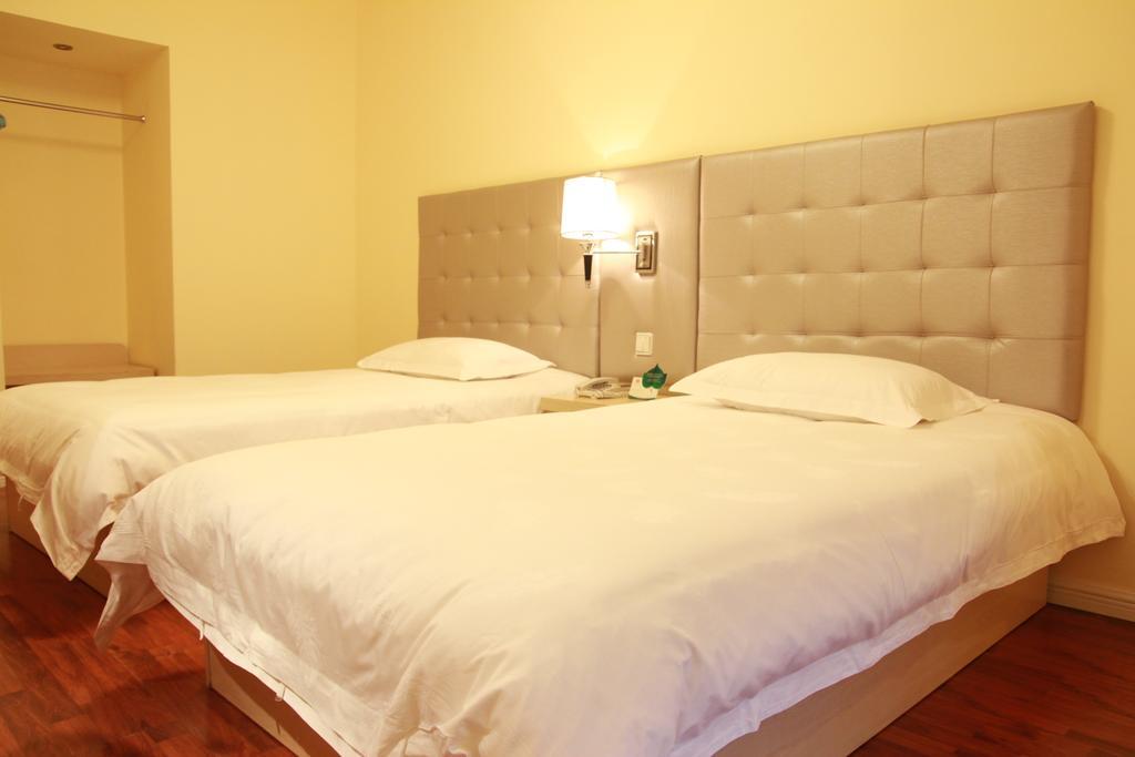 Qingdao Renjia Bussiness Hotel Camera foto