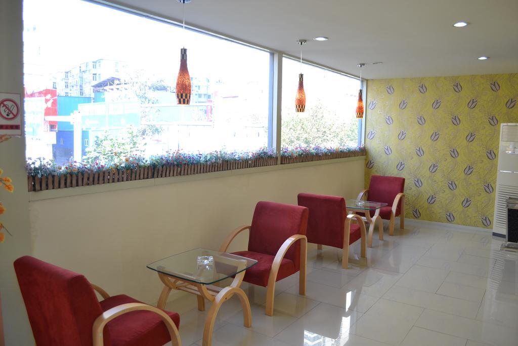 Qingdao Renjia Bussiness Hotel Camera foto
