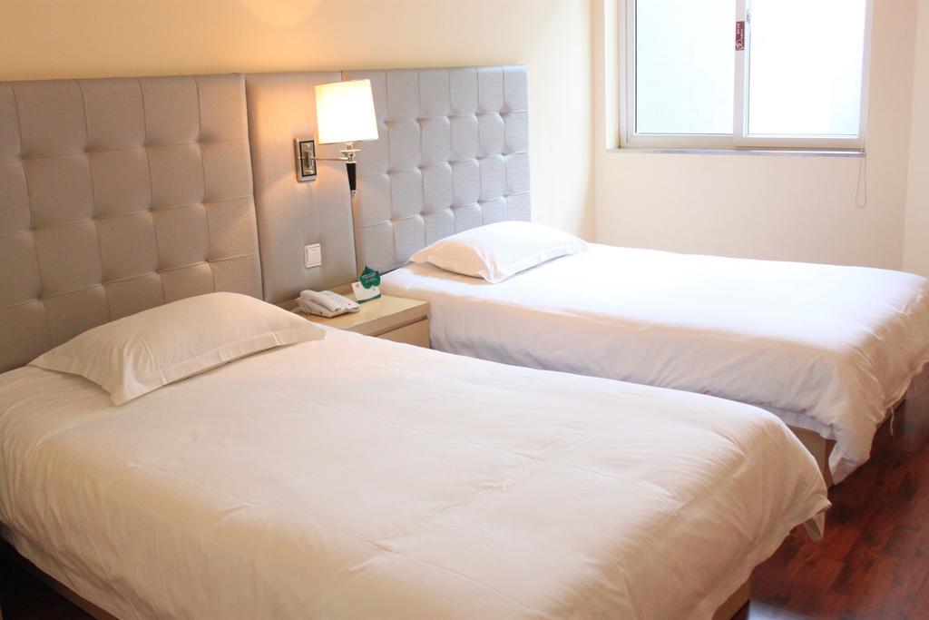 Qingdao Renjia Bussiness Hotel Camera foto