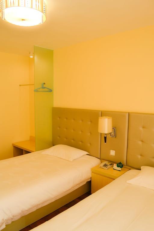 Qingdao Renjia Bussiness Hotel Esterno foto