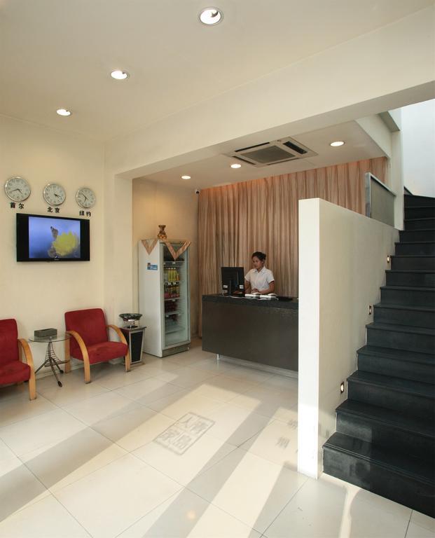 Qingdao Renjia Bussiness Hotel Esterno foto