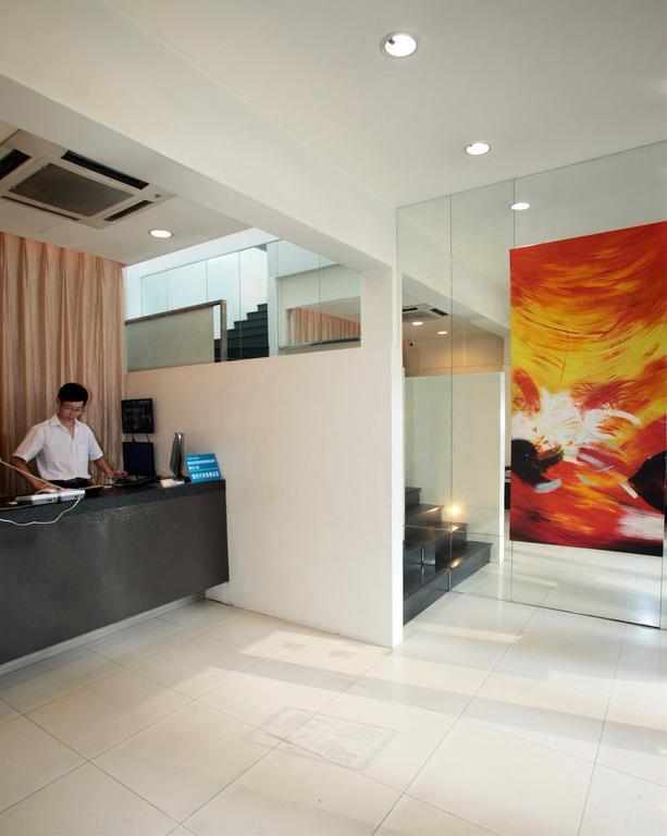 Qingdao Renjia Bussiness Hotel Esterno foto