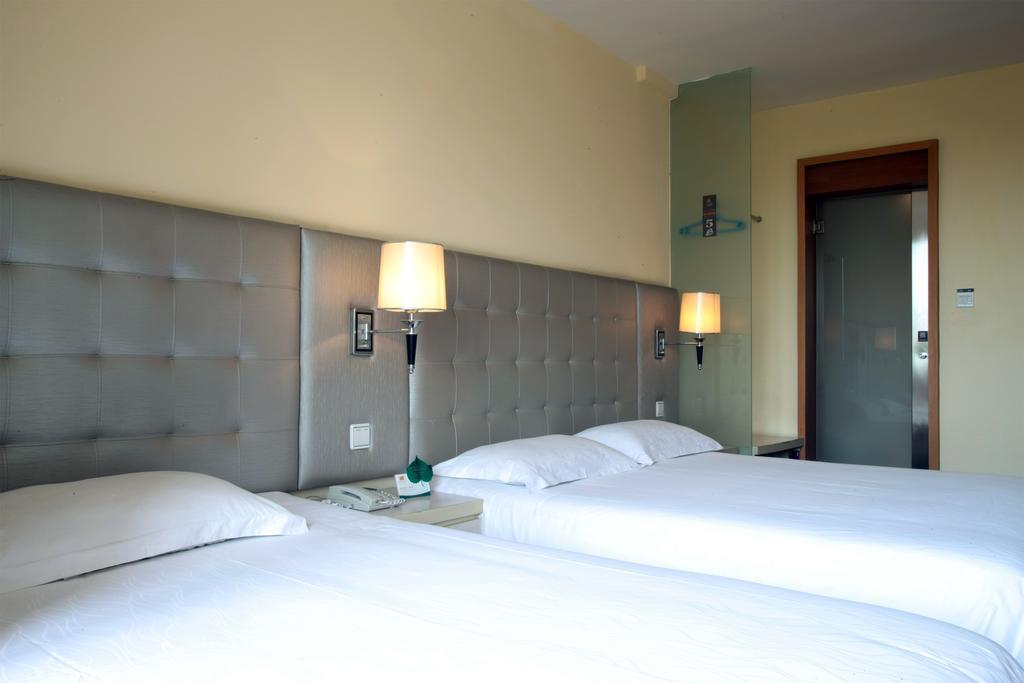 Qingdao Renjia Bussiness Hotel Esterno foto
