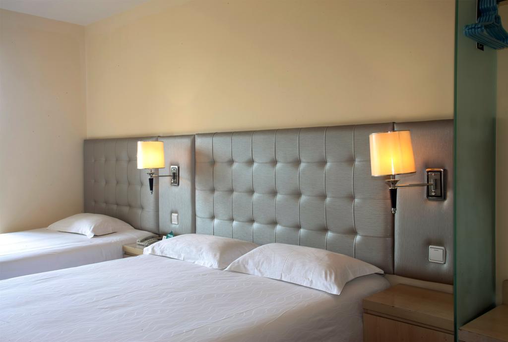 Qingdao Renjia Bussiness Hotel Esterno foto