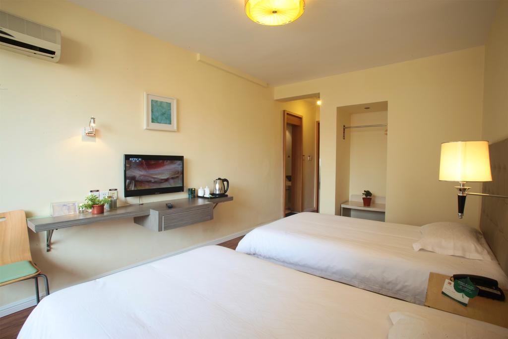 Qingdao Renjia Bussiness Hotel Esterno foto