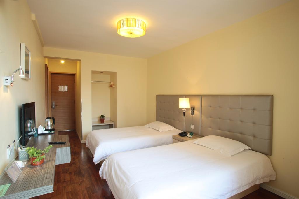 Qingdao Renjia Bussiness Hotel Esterno foto