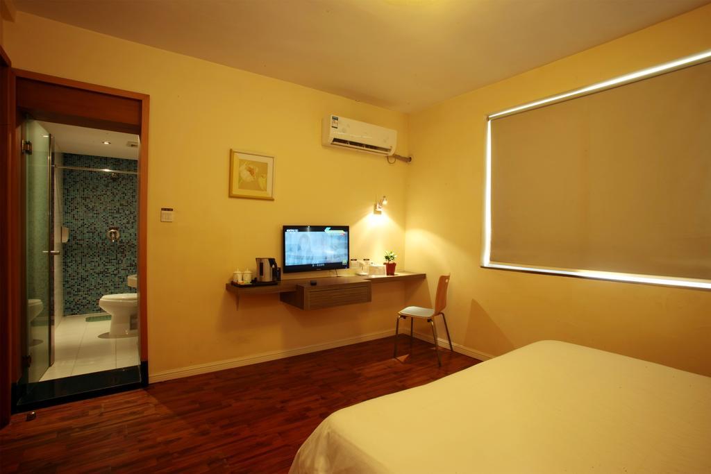 Qingdao Renjia Bussiness Hotel Esterno foto