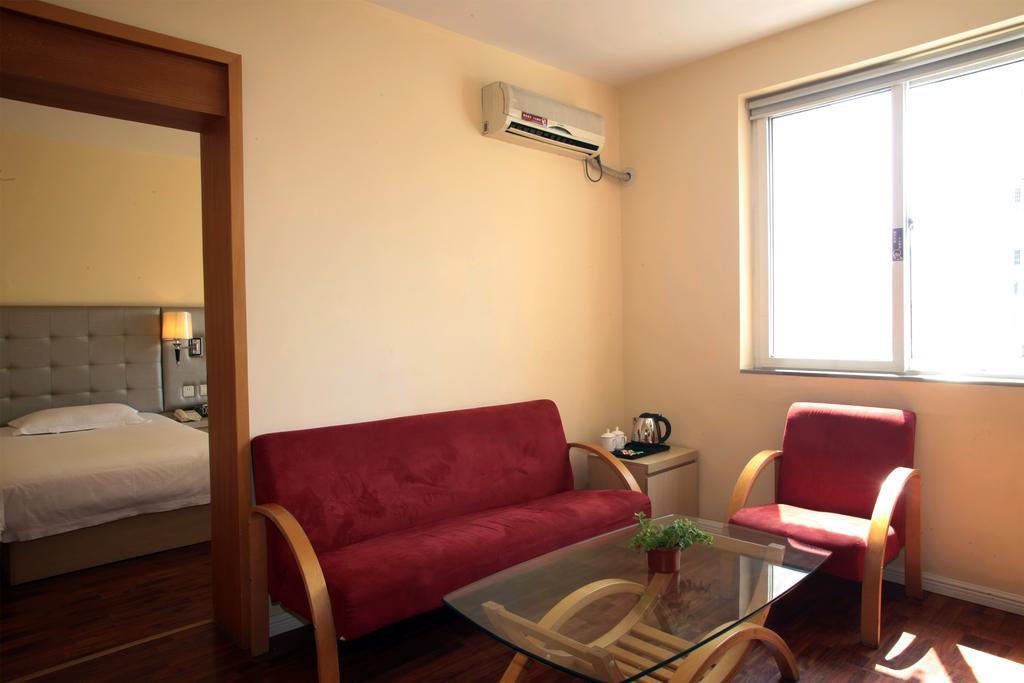 Qingdao Renjia Bussiness Hotel Esterno foto
